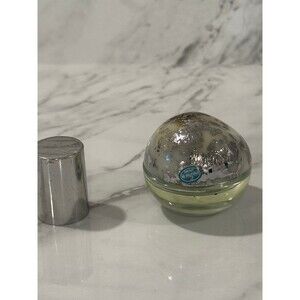 DKNY Be Delicious. Light floral small lid has some scuffs bottle mini size
